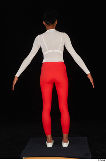 Adelle Sabelle casual dressed red leggings standing white flat ballerinas…